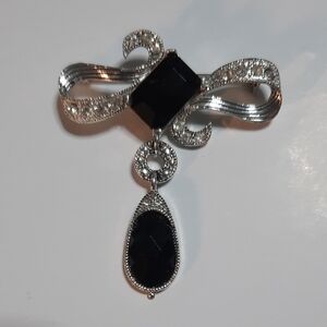 Elegant Black and Silver Brooch